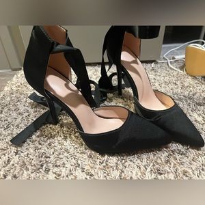 Lace up black satin pumps